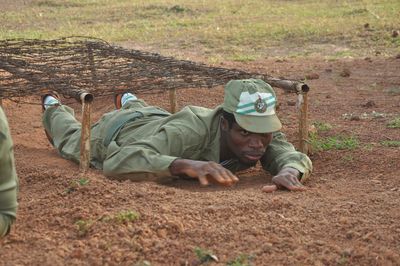 Rear view of man standing on field