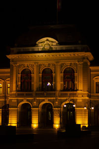 Illuminated building at night