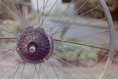 Close-up of rusty bicycle wheel