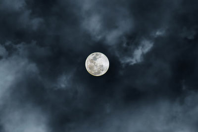 Low angle view of moon against sky