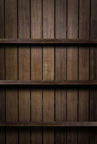 Empty wood shelf,bookshelves on brown wood