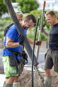 Workers preparing foundations