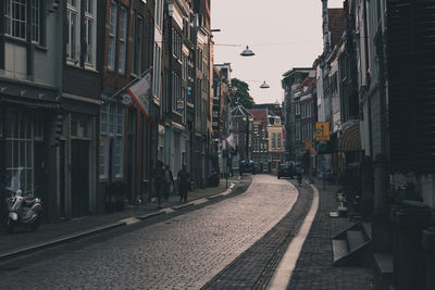 Street in city against clear sky