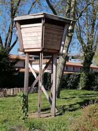 Built structure on field against sky