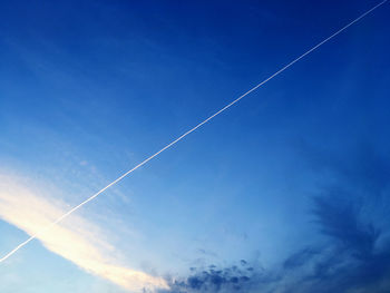 Low angle view of vapor trail in sky