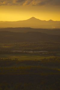 View of countryside landscape at sunset