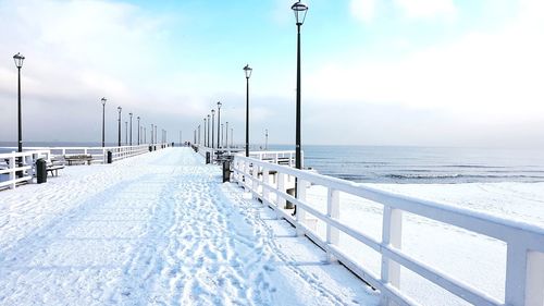 Scenic view of sea against sky during winter