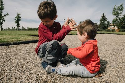 Two young children having fun in a playground