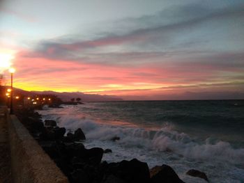 Scenic view of sea at sunset