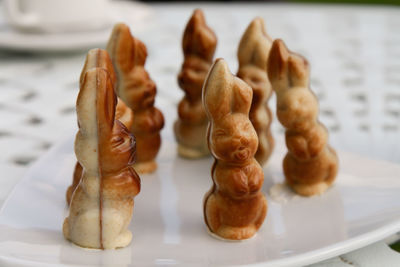 Close-up of chocolate easter bunnies on plate