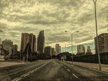 View of city against cloudy sky