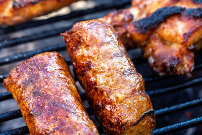 Close-up of meat on barbecue grill