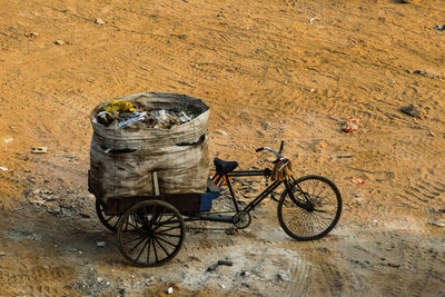 Garbage vehicle cart waiting for its owner