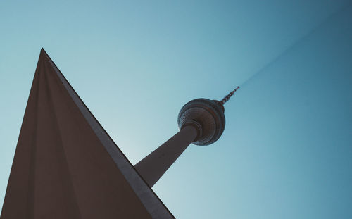 Low angle view of building against blue sky