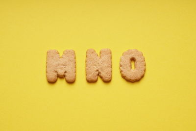Cookies letters on yellow background