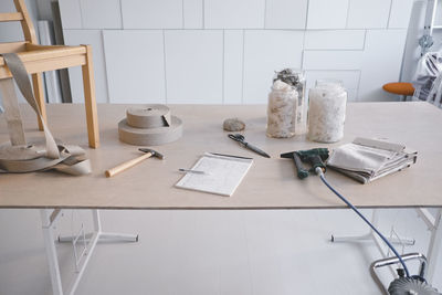 Variety of equipment on desk in design studio