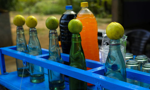 Close-up of glass bottles on table