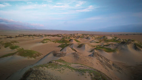 Scenic view of desert against sky