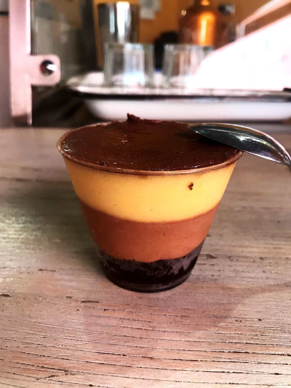 CLOSE-UP OF COFFEE AND DRINK ON TABLE