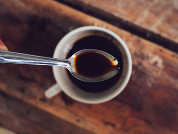 High angle view of coffee cup on table