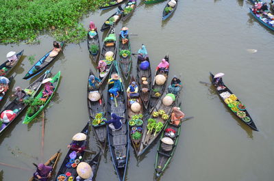 High angle view of people enjoying in river