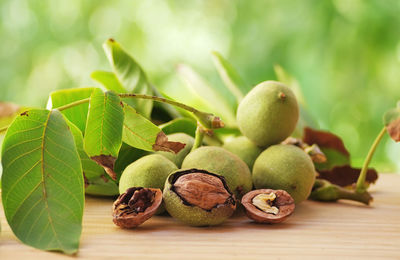 Close-up of walnut fruits on table