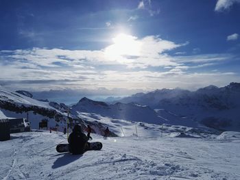 Scenic view of snowcapped mountains against sky