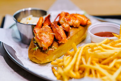 Lobster roll and french fries 