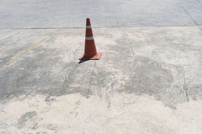 High angle view of arrow sign on road