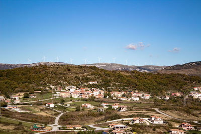 Scenic view of residential buildings against sky