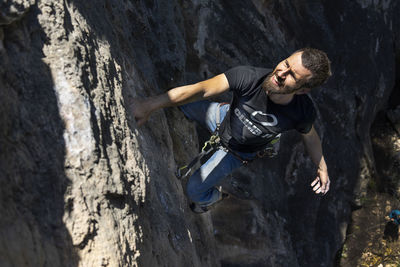 Man climbing on rock