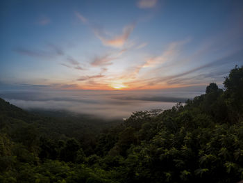 Scenic view of landscape against sky during sunset