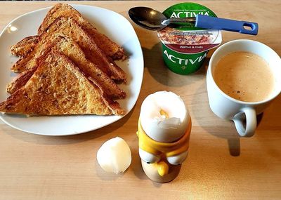 High angle view of breakfast served on table