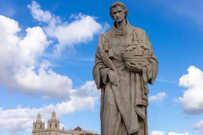 Low angle view of statue against sky