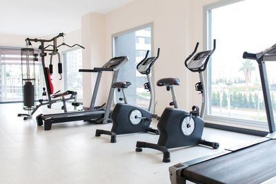 Low section of man exercising in gym