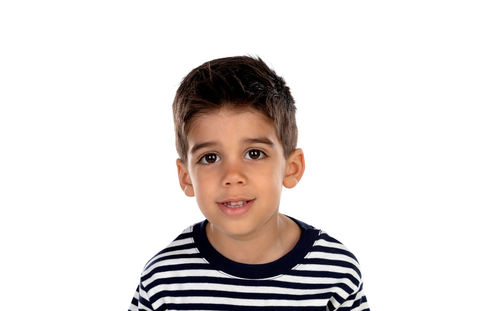 Portrait of boy against white background