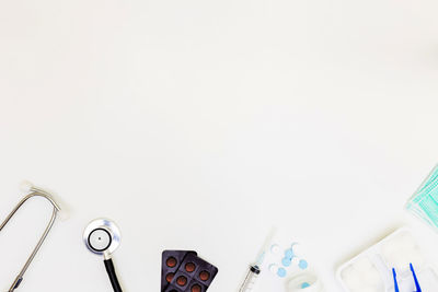 High angle view of art on table against white background