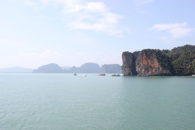 Scenic view of bay against sky