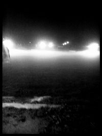 Scenic view of landscape against sky at night