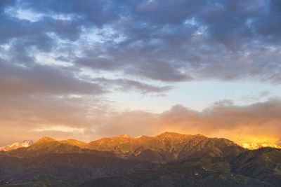 Scenic view of mountains against sky during sunset