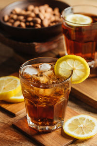 Glass of drink on table