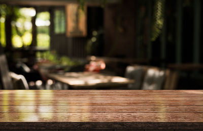 Close-up of empty chairs and table in restaurant