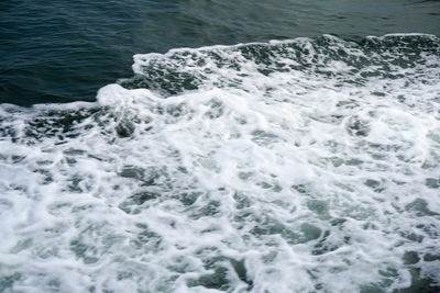 Sea waves splashing on shore