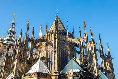 Low angle view of temple against blue sky