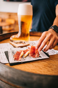 Close-up of beer glass on table