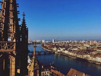 View of cityscape against blue sky