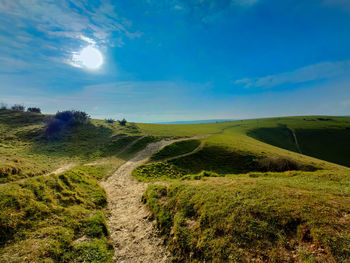 Scenic view of land against sky