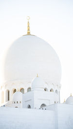 Low angle view of mosque against sky