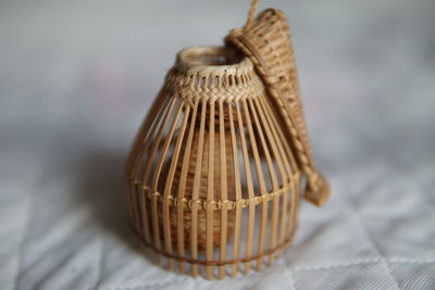 Close-up of wicker basket on table