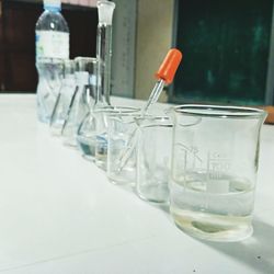 Close-up of laboratory glassware on table